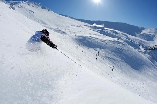 Skier enjoys a run on Mid-Towers at Mt Hutt before getting onto the groomed International run.